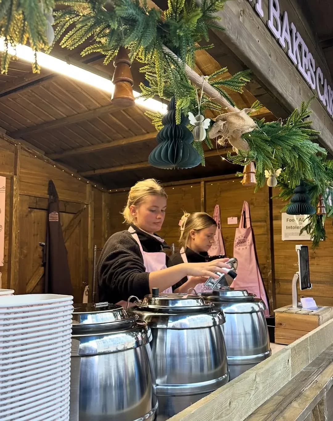Beth serving customers at her market stall