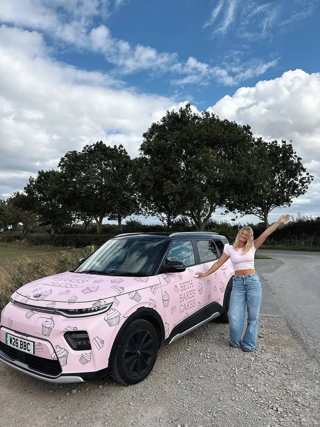 Beth's branded pink delivery car