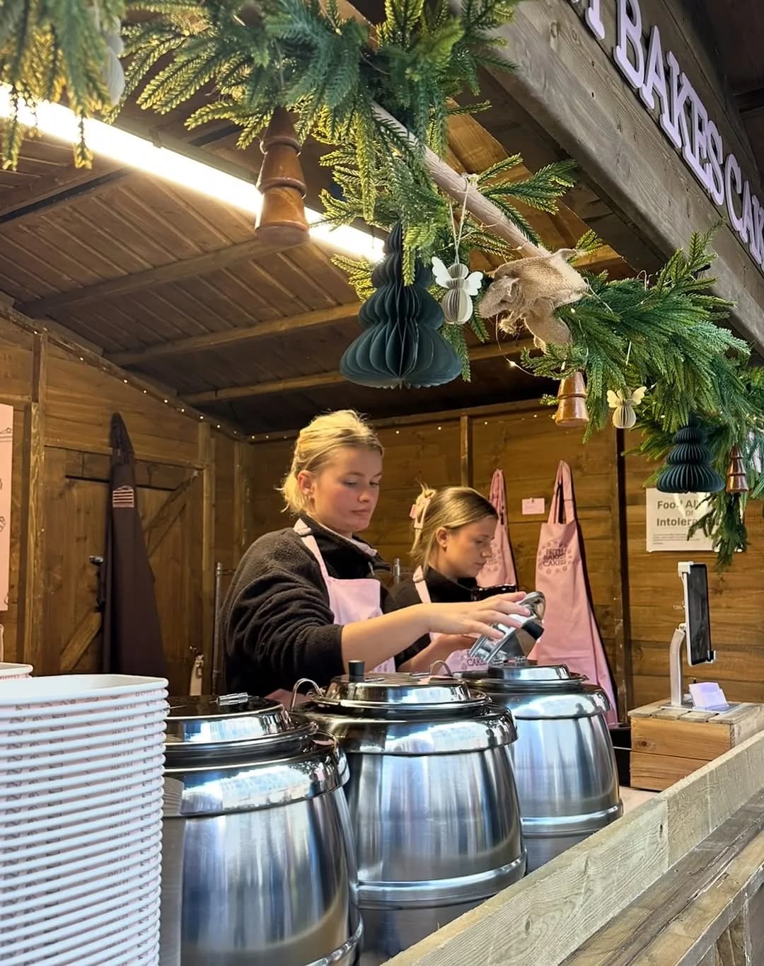 Beth serving customers at her market stall